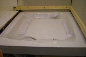 We install the new shower tray. from project Diary of A Shower Refit, Dublin 8