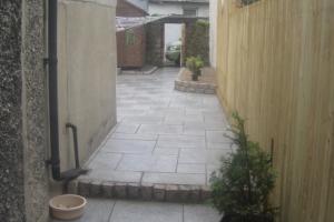 Granite path and steps to patio area from project Granite Paving Ideas