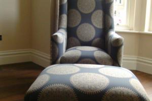 Upholstered armchair and matching footrest. from project Chair Upholstery Dublin