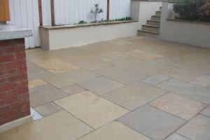 And after from project Limestone Patio with Decorative Walls